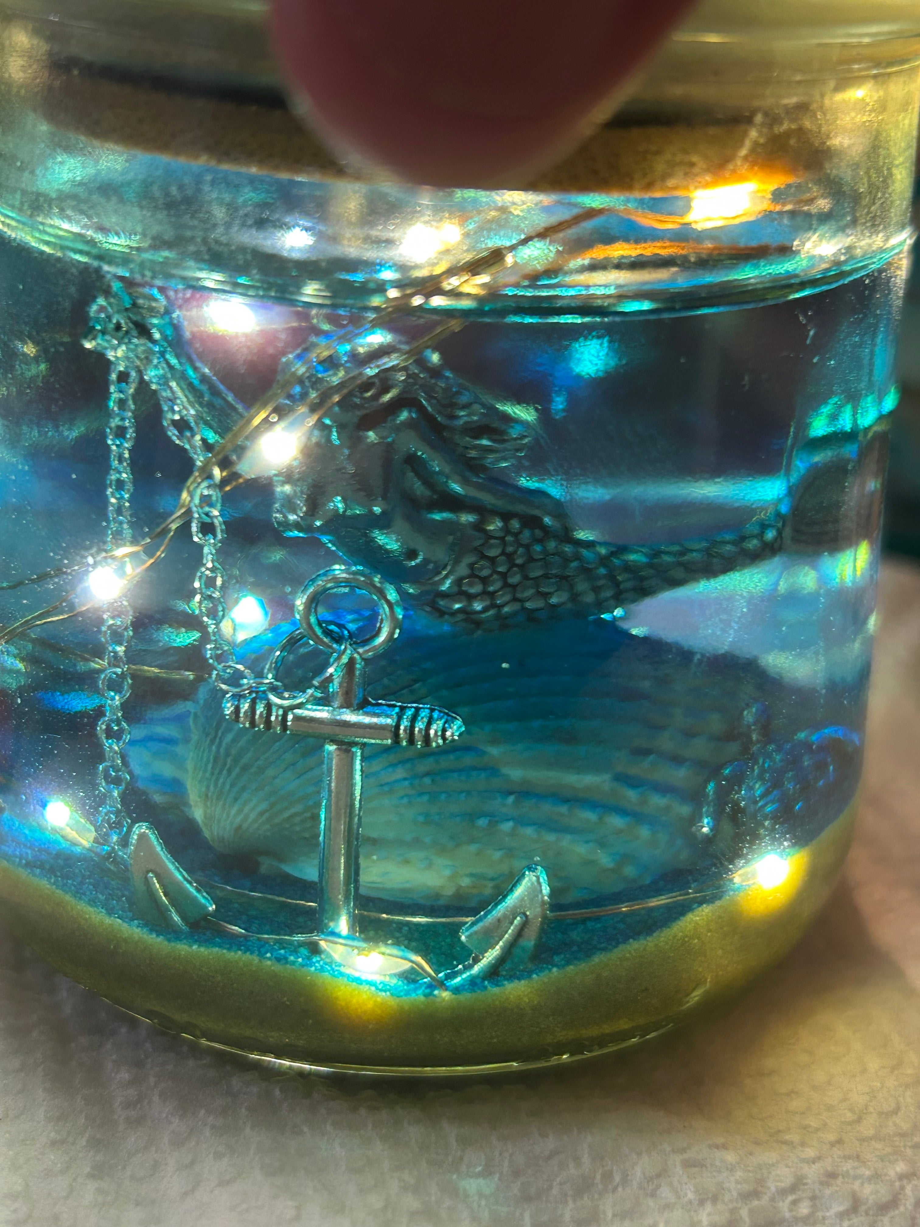 5oz jar with mermaid, boat anchor, boat steering wheel, turtle and lights